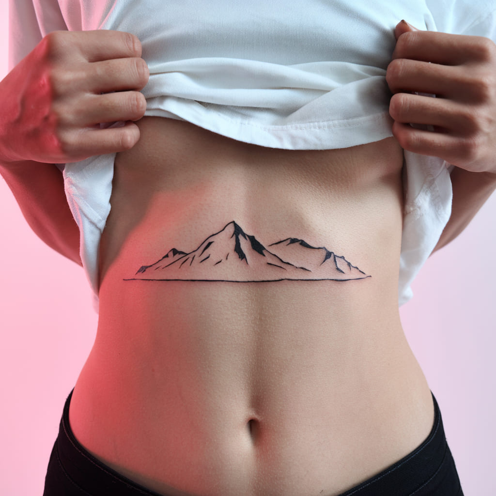 Mountain Range Waist Tattoo